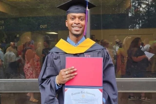 <p>change.org</p> Christopher Gilbert poses with his master’s degree.