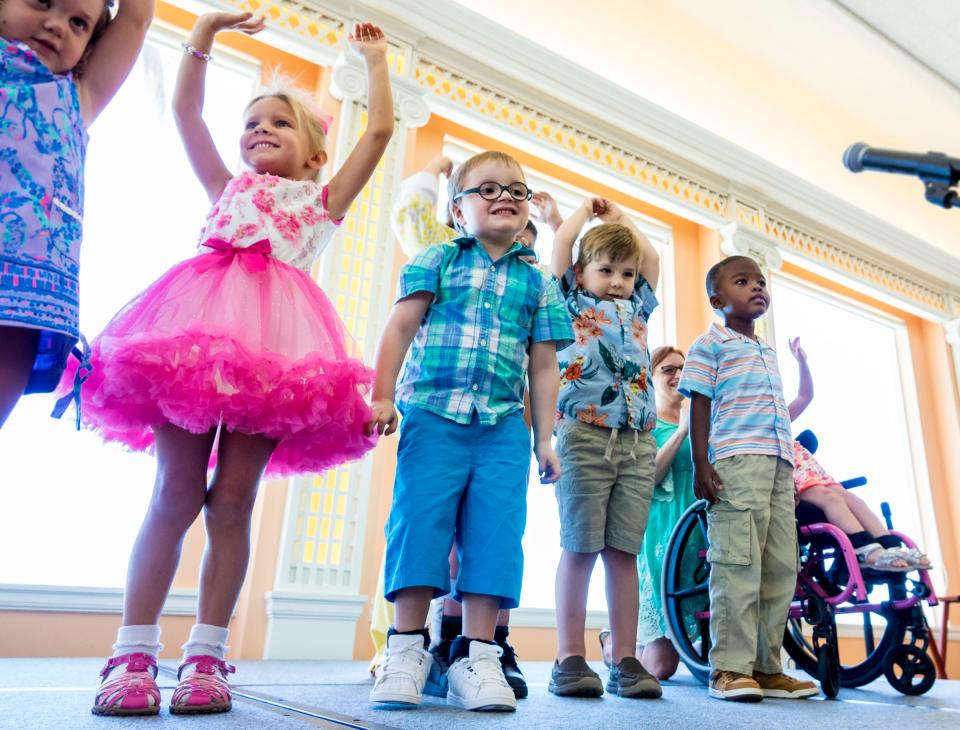 Preschoolers perform "The farmer plants the seed" during the Rehabilitation Center for Children and Adults spring luncheon in 2018 at the Beach Club. This year's luncheon is set for April 24 at The Beach Club.