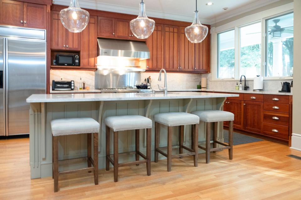 The kitchen has a modern look thanks to an upgrade by a previous owner.