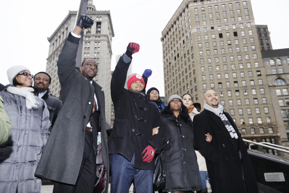 Yusef Salaam, left, with Kevin Richardson and&nbsp;Raymond Santana at a rally with supporters in New York, after a hearing in their lawsuit against the city, Jan. 17, 2013. (Photo: ASSOCIATED PRESS)