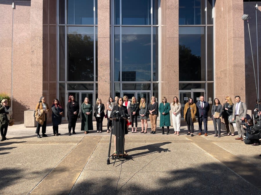 Plaintiffs, doctors, and attorneys address the press outside the Texas Supreme Court on Nov. 28, 2023.