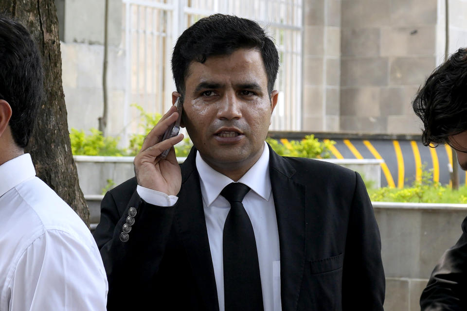Naeem Haider Panjutha, a lawyer of Pakistan's former Prime Minister Imran Khan's legal team, leaves after Khan's appeal hearing in a court, in Islamabad, Pakistan, Wednesday, Aug. 9, 2023. A top Pakistani court Wednesday said it wanted to hear from the government before deciding over the imprisonment of former Prime Minister Imran Khan on corruption charges. Khan was arrested at his Lahore home on Saturday and given a three-year jail sentence on charges of concealing assets. He is held at the high-security prison Attock while his legal team seeks his release. (AP Photo/Anjum Naveed)