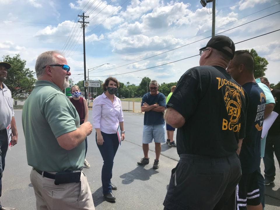 U.S. Senate candidate Amy McGrath spoke to people at a rally union workers held Wednesday in Louisville to urge the Senate to pass the HEROES Act, a coronavirus relief bill congressional Democrats crafted.