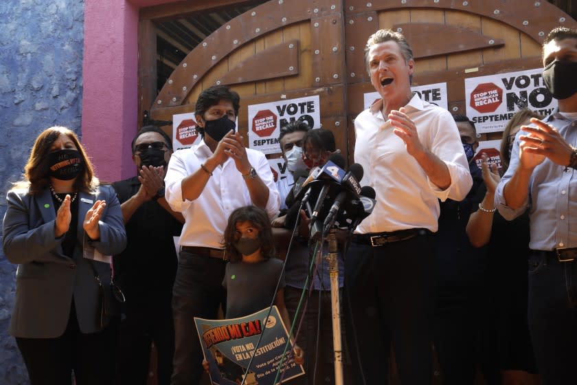 EAST LOS ANGELES, CA - AUGUST 14, 2021 - -California Gov. Gavin Newsom makes a statement against his recall while meeting with Latino leaders at Hecho en Mexico restaurant in East Los Angeles on August 14, 2021. Governor Newsom met with volunteers who were working the phone banks calling voters to vote against the recall at the restaurant. Los Angeles City Councilman Kevin de Leon, California, California Assemblyman Miguel Santiago, California State Senator Maria Elena Durazo and other dignitaries were on hand to support the governor. (Genaro Molina / Los Angeles Times)