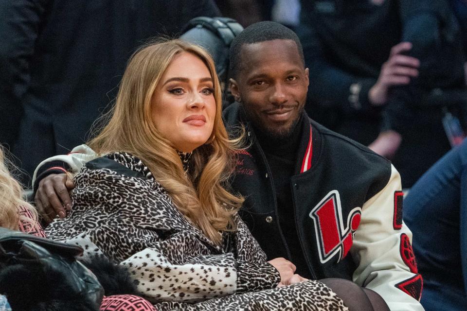 February 20, 2022; Cleveland, Ohio, USA; Recording artist Adele (left) and American sports agent Rich Paul (right) during the second quarter in the 2022 NBA All-Star Game at Rocket Mortgage FieldHouse. Mandatory Credit: Kyle Terada-USA TODAY Sports