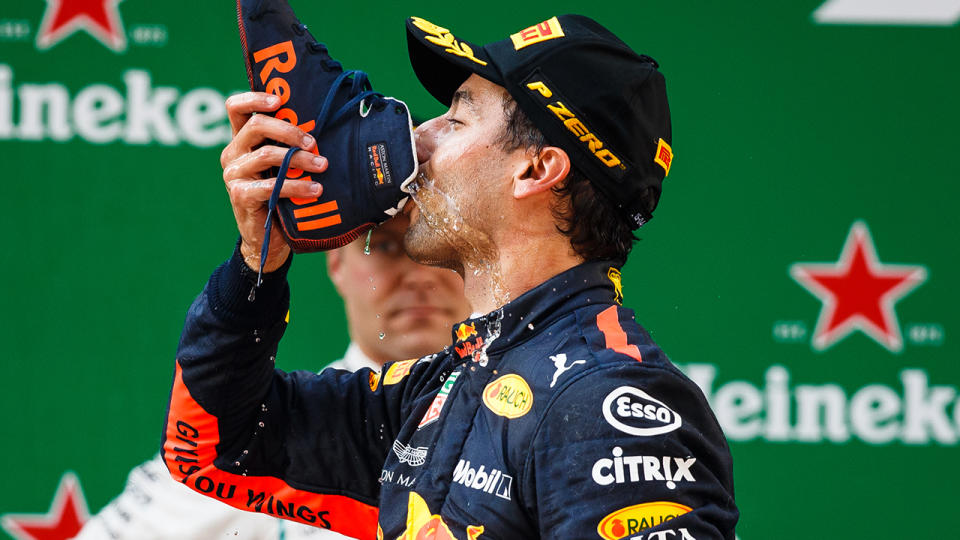 Ricciardo’s signature shoey. Image: Getty