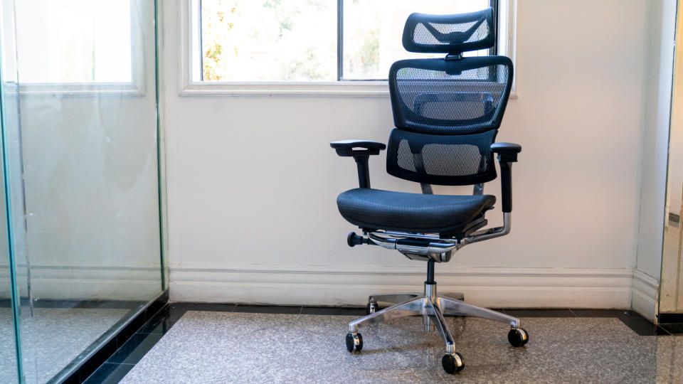 Black mesh OdinLake Ergo PLUS 743 office chair in an office hallway