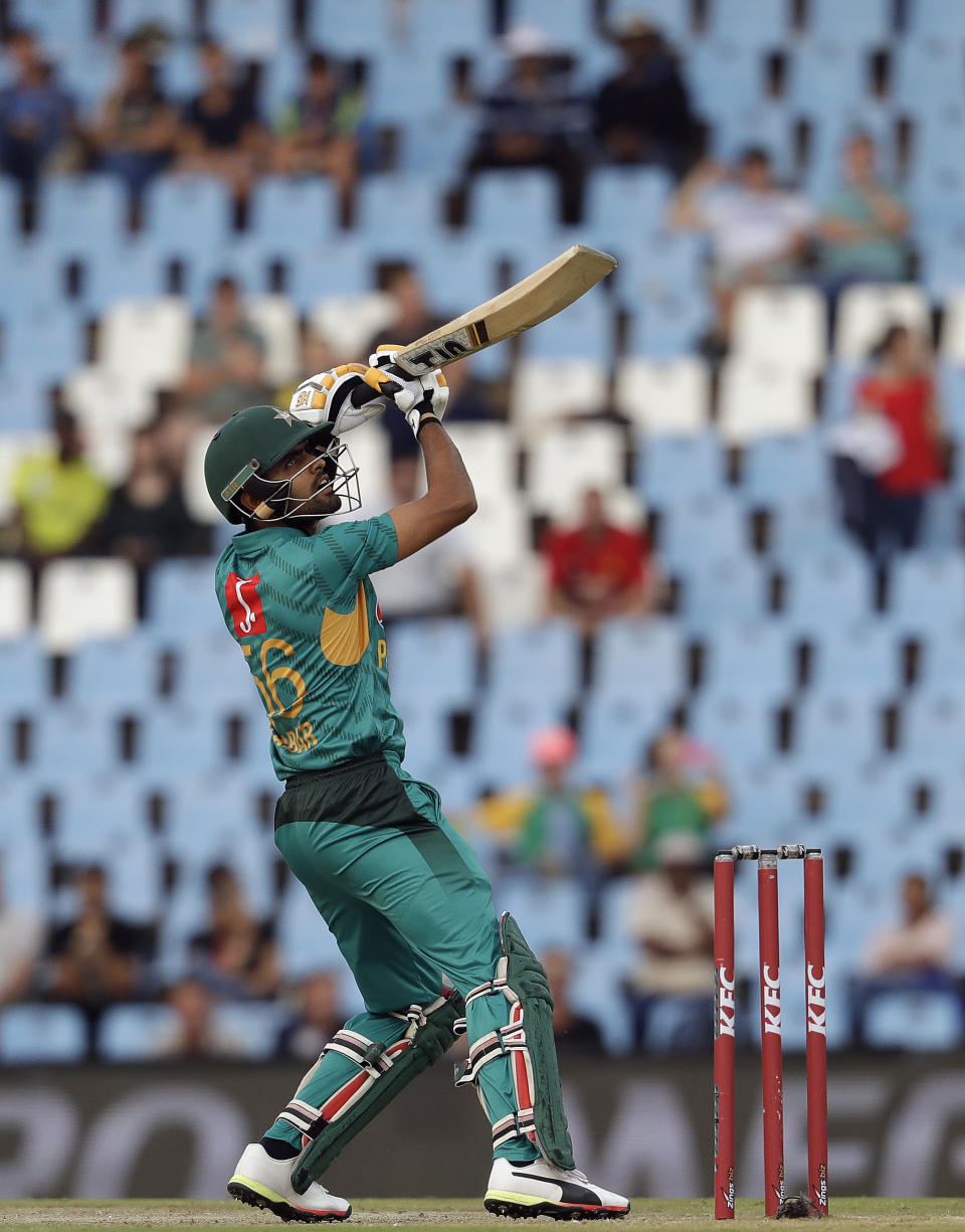Pakistan's batsman Babar Azam watches his shot during the third T20 cricket match between South Africa and Pakistan at the Centurion Park in Pretoria, South Africa, Wednesday, Feb. 6, 2019. (AP Photo/Themba Hadebe)