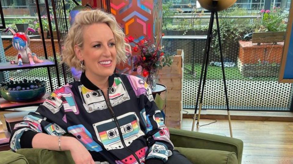 Steph McGovern in a jacket covered with cassette tapes