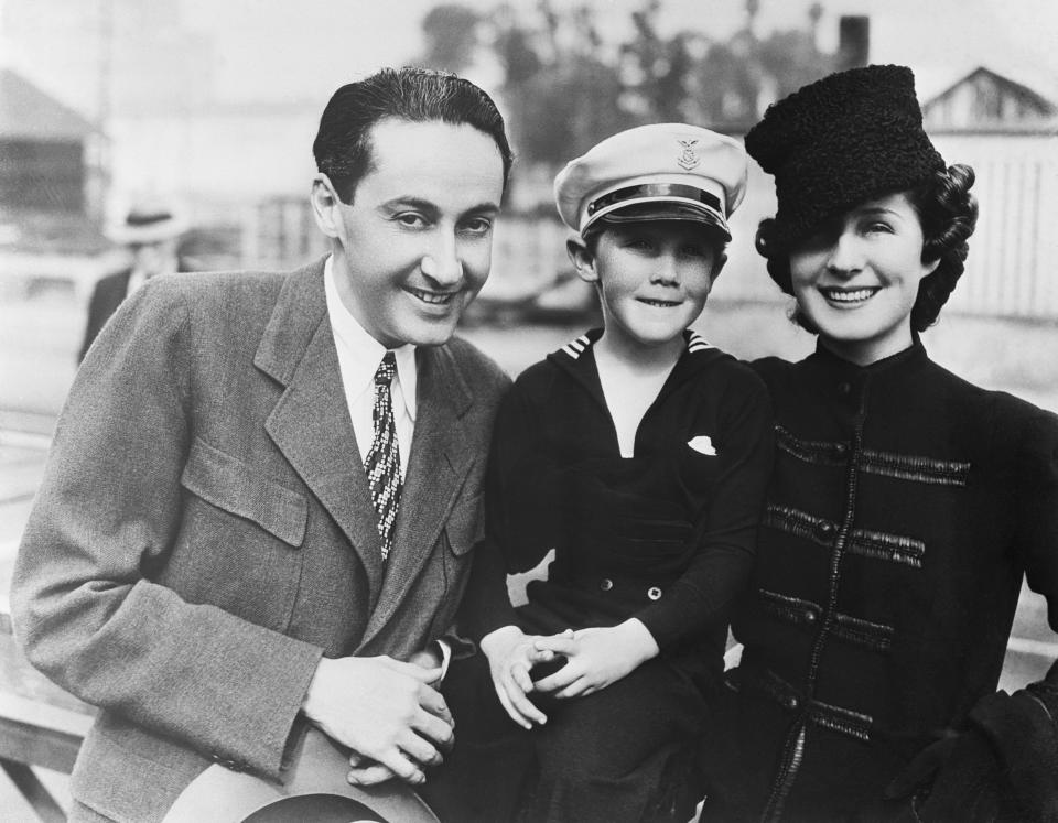 Producer Irving Thalberg stands with his wife, actress Norma Shearer, and their six-year-old son Irving Thalberg, Jr.