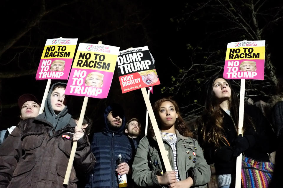 <p>JAN. 20, 2017 – Protesters holding placards attend a demonstration against U.S. President Donald J. Trump outside the United States Embassy in London, England. Mr Trump has become the 45th President of the United States following an inauguration ceremony in Washington, DC today. (Photo: Jay Shaw Baker/NurPhoto via Getty Images) </p>