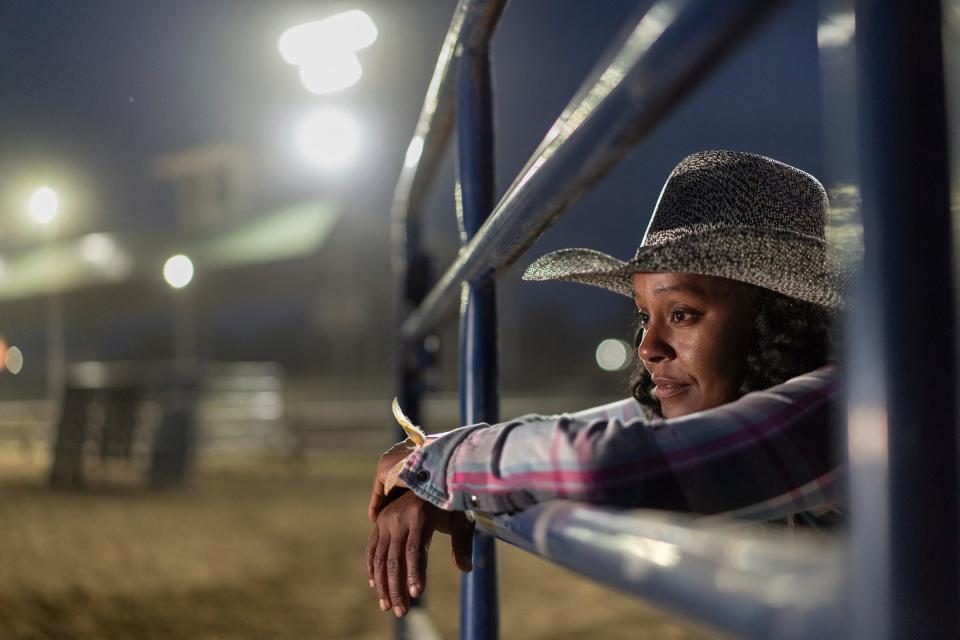 Staci Russell, 39, of Belleville, poses at the arena where she took home first place in barrels racing two times over the course of the two-day 2023 Midwest Invitational Rodeo at the Wayne County Fairgrounds in Belleville on Saturday, June 10, 2023.