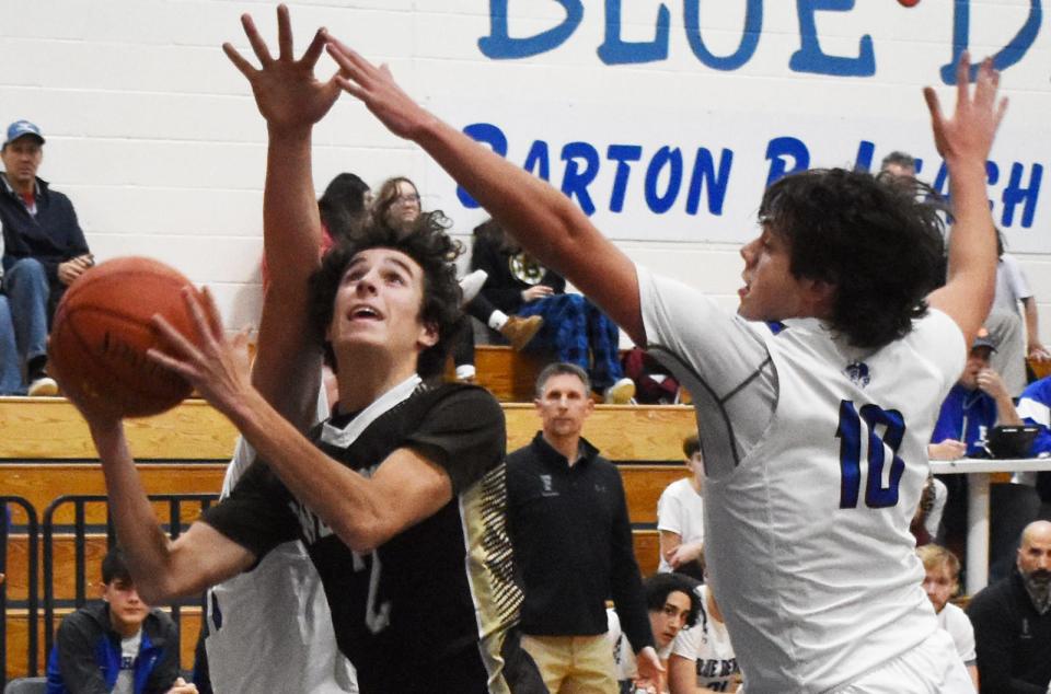 Westport's Ben Boudria drives past Fairhaven's Ryan Ptaszenski.