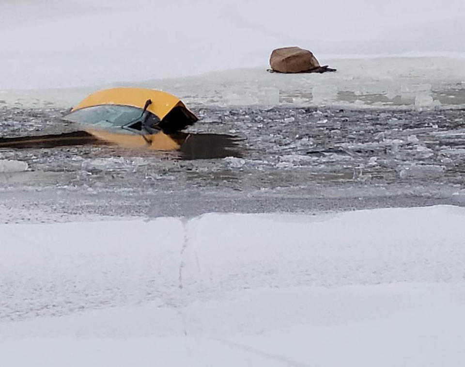 A fully submerged car in Rideau River in Ottawa.