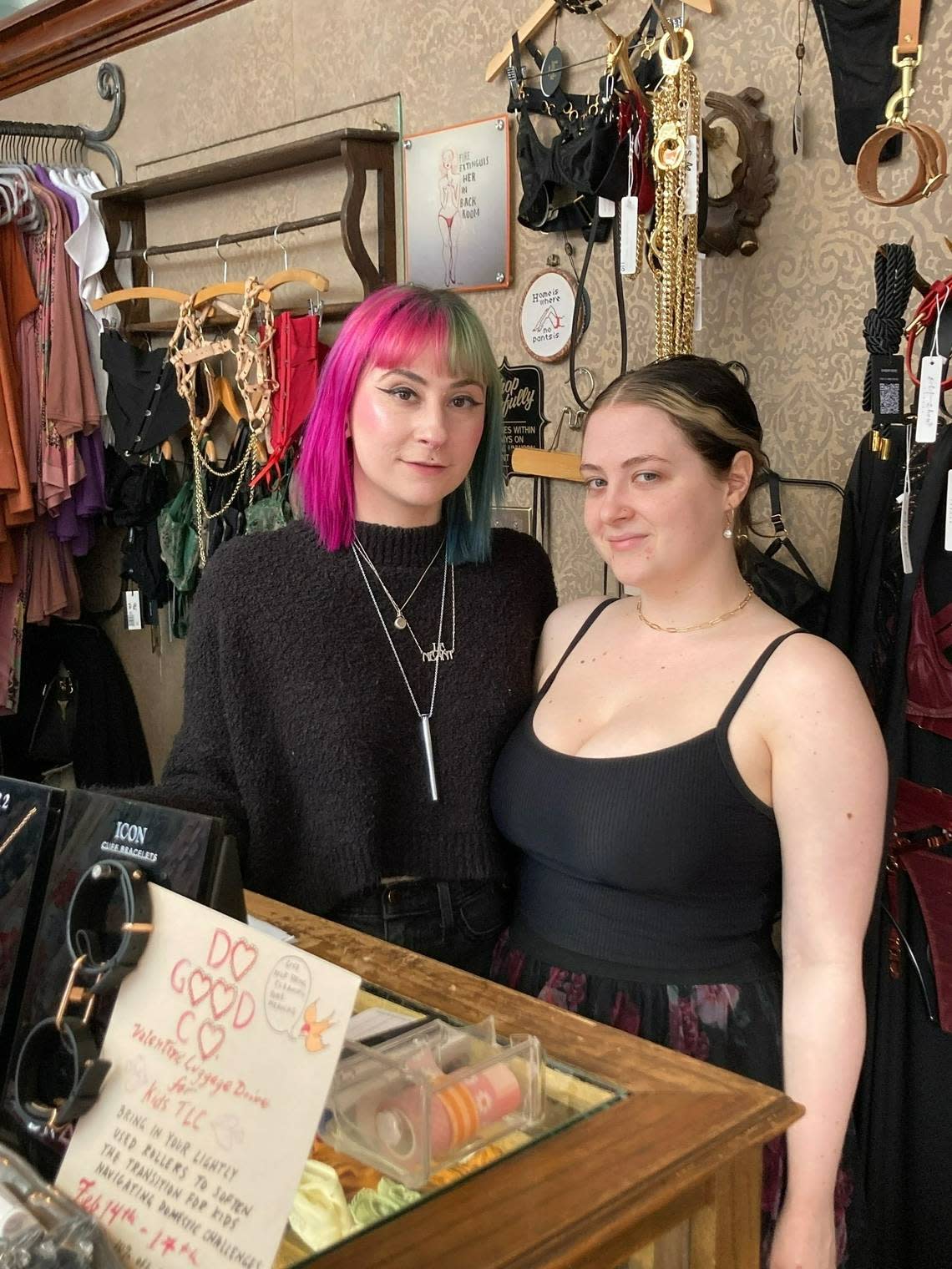 Kasey Burmood, 34, and Peyton West, 26, sell lingerie at Birdies, a shop celebrating its 21st anniversary on Valentine’s Day, Wednesday, Feb. 14. “It would have been ideal if the parade could have been on Friday,” said owner Peregrine Honig. Eric Adler/eadler@kcstar.com