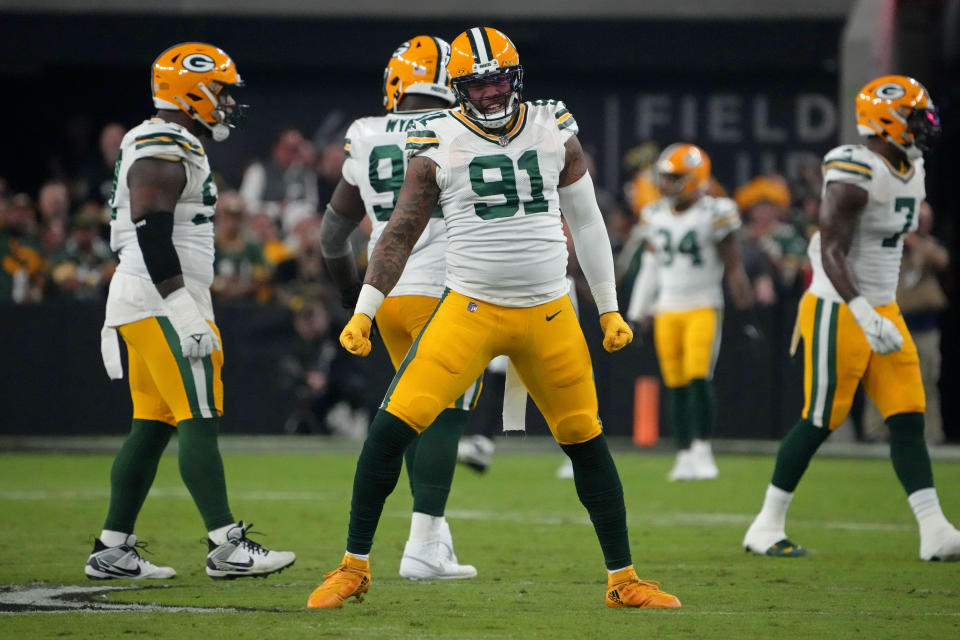 Oct 9, 2023; Paradise, Nevada, USA; Green Bay Packers linebacker <a class="link " href="https://sports.yahoo.com/nfl/players/28426" data-i13n="sec:content-canvas;subsec:anchor_text;elm:context_link" data-ylk="slk:Preston Smith;sec:content-canvas;subsec:anchor_text;elm:context_link;itc:0">Preston Smith</a> (91) celebrates against the Las Vegas Raiders] in the first half at Allegiant Stadium. Mandatory Credit: Kirby Lee-USA TODAY Sports