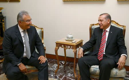 Turkey's President Tayyip Erdogan (R) meets with Deniz Baykal, a veteran opposition lawmaker from the Republican People's Party (CHP), in Ankara, Turkey, June 10, 2015. REUTERS/Kayhan Ozer/Presidential Palace Press Office/Handout via Reuters