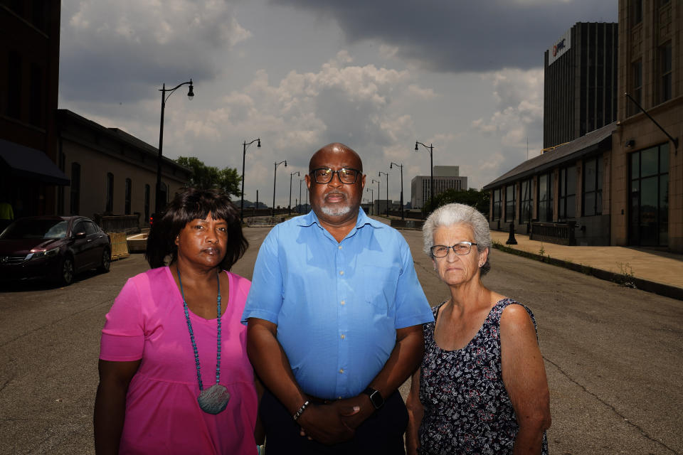 Relatives of Carl Grant, from left, his sister, Kathy Jenkins; brother, William Jenkins, and Grant’s partner, Ronda Hernandez, stand for a portrait in Birmingham, Ala., on Wednesday, June, 7, 2023. “We were robbed,” says Kathy Jenkins, whose anger has not subsided four years after Grant’s death. “It’s like somebody went in your house and just took something, and you were violated.” (AP Photo/Brynn Anderson)