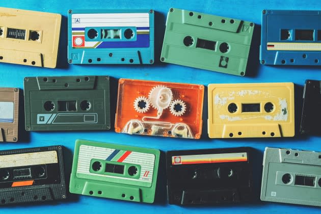Old cassette tapes on blue wooden table, top view - Credit: kulzfotolia/Adobe Stock