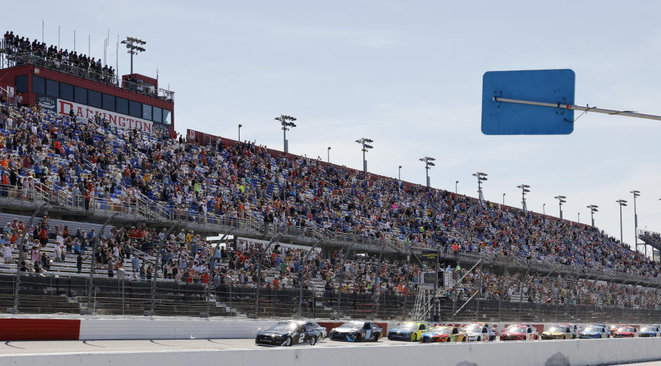 Brad Keselowski (2) leads the field to start the NASCAR Cup Series auto race at Darlington Raceway, Sunday, May 9, 2021, in Darlington, S.C. (AP Photo/Terry Renna)