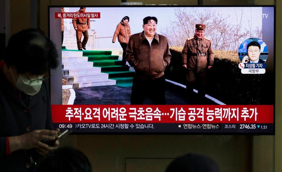 People watch a news segment pertaining to a North Korean missile launch, at a station in Seoul, South Korea (EPA)