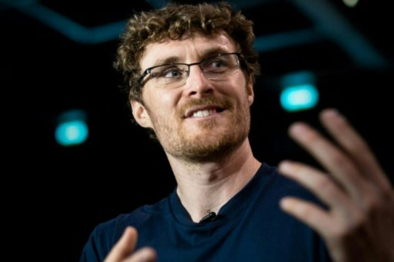 Paddy Cosgrave of the Web Summit and Rise Conference gestures as he gives an interview at the Rise technology conference in Hong Kong on July 31, 2015