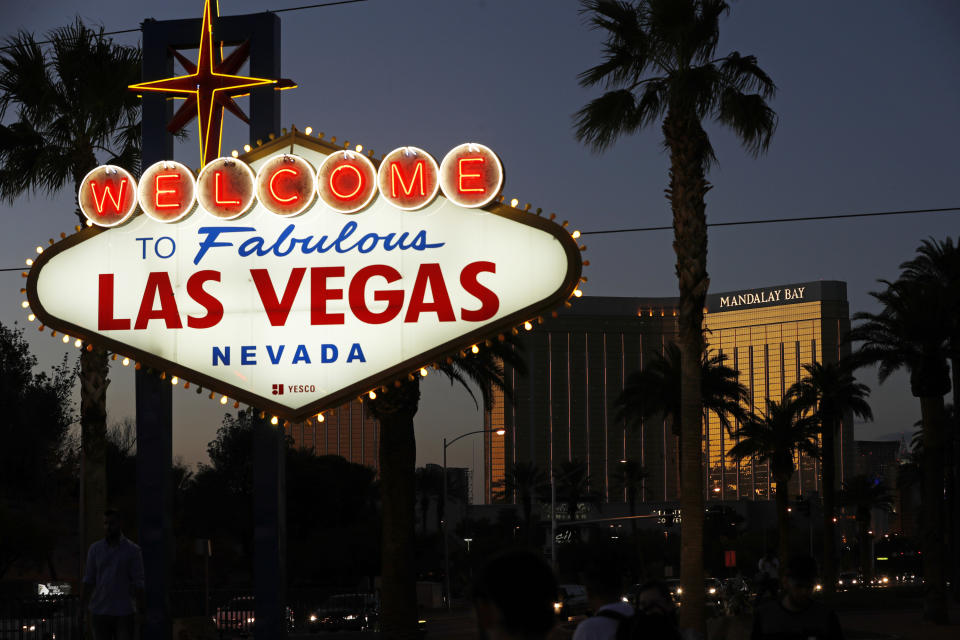 FILE - In this Sept. 21, 2018, file photo, the Mandalay Bay hotel and casino reflects the last sunlight of the day along the Las Vegas Strip in Nevada. The hotel was the scene of the the worst mass shooting in modern U.S. history. President Donald Trump is "disappointed" the FBI couldn't figure out what specifically motivated a gunman to carry out the deadliest shooting in modern U.S. history. Trump's comments to The Daily Caller on Wednesday, Jan. 30, 2019, came a day after the FBI released its final report on the 2017 Las Vegas shooting that left 58 people dead. (AP Photo/John Locher, File)