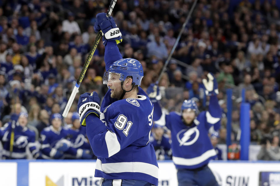 Tampa Bay Lightning center Steven Stamkos (91) celebrates his goal against the Boston Bruins during the second period of an NHL hockey game Thursday, Dec. 12, 2019, in Tampa, Fla. (AP Photo/Chris O'Meara)