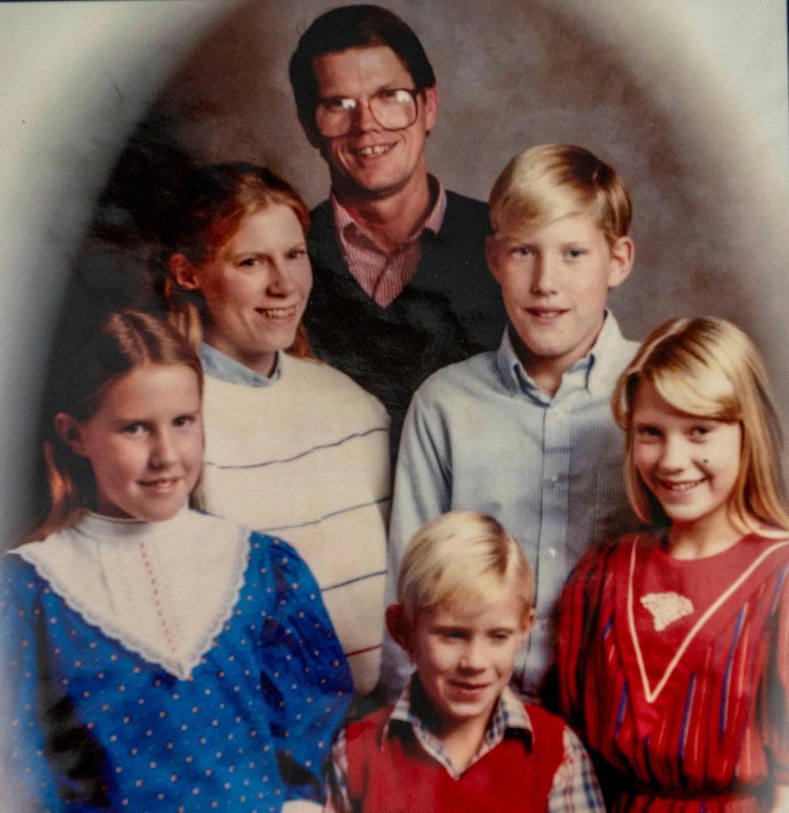 Matthew Moore, who grew up in Iowa and New Mexico, keeps a photo album dedicated to his family’s history. The cover shows him in the top right corner with his parents and three siblings. “I was raised conservative, Republican, right-wing Christian … things like that,” he says.