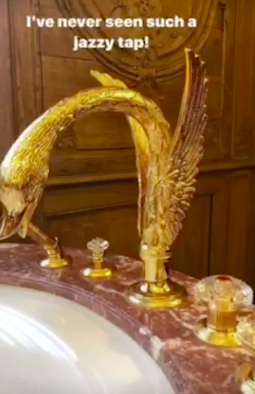 The bathroom featured this gold tap in the shape of a swan. Source: Instagram/Victoria Beckham