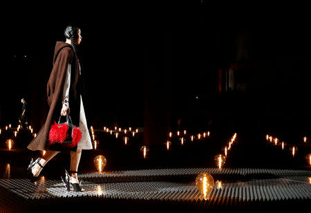 A model presents a creation by Prada during the Milan Fashion Week in Milan, Italy February 21, 2019. REUTERS/Alessandro Garofalo