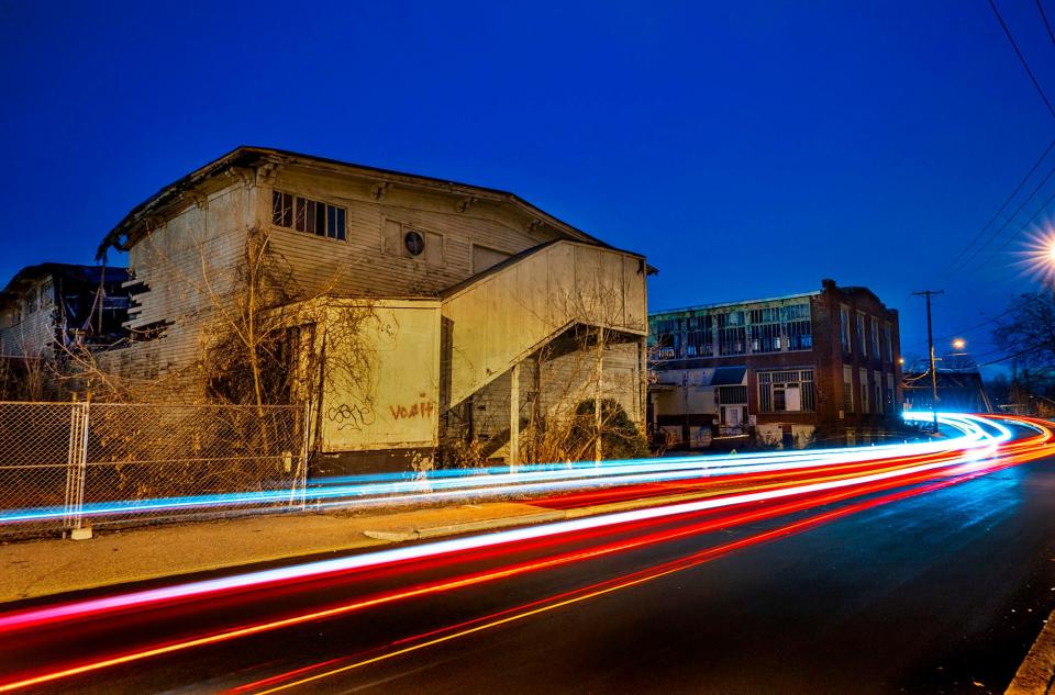 Woonsocket plans to use funding from the American Rescue Plan Act to tear down blighted buildings, such as this derelict mill at 719 River St.