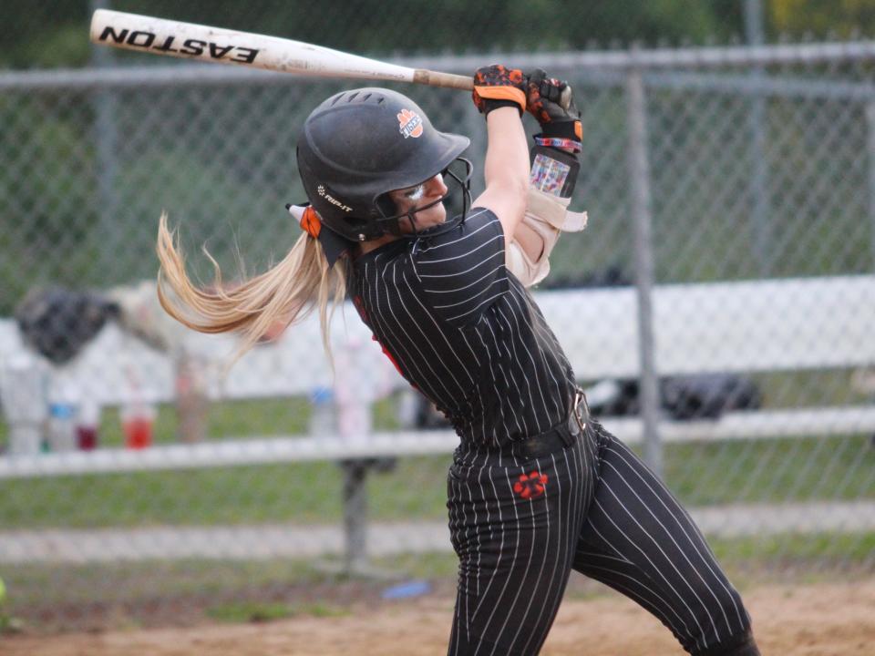 Taunton's Brooke Aldrich hits a double during a Hockomock League game against King Philip.