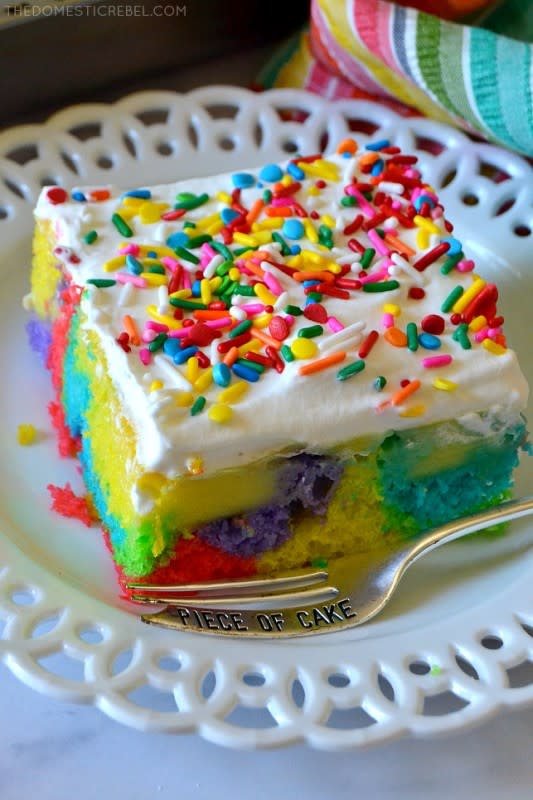 <p>This amazing rainbow poke cake is sure to make everyone excited and happy with its delicious flavor and gorgeous presentation!</p><p><strong>Get the recipe: <a href="https://thedomesticrebel.com/2020/05/18/amazing-rainbow-poke-cake/" rel="nofollow noopener" target="_blank" data-ylk="slk:Amazing Rainbow Poke Cake;elm:context_link;itc:0;sec:content-canvas" class="link rapid-noclick-resp"><em>Amazing Rainbow Poke Cake</em></a></strong></p>