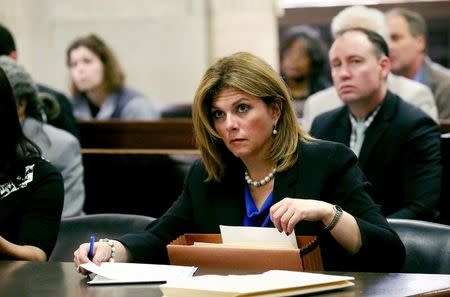 Prosecutor Lynn McCarthy, from the office of Cook County State's Attorney, looks toward the judge at the Jason Van Dyke hearing on Thursday morning, May 5, 2016 at the Leighton Criminal Court Building in Chicago, Illinois, U.S. REUTERS/Nancy Stone/Pool)