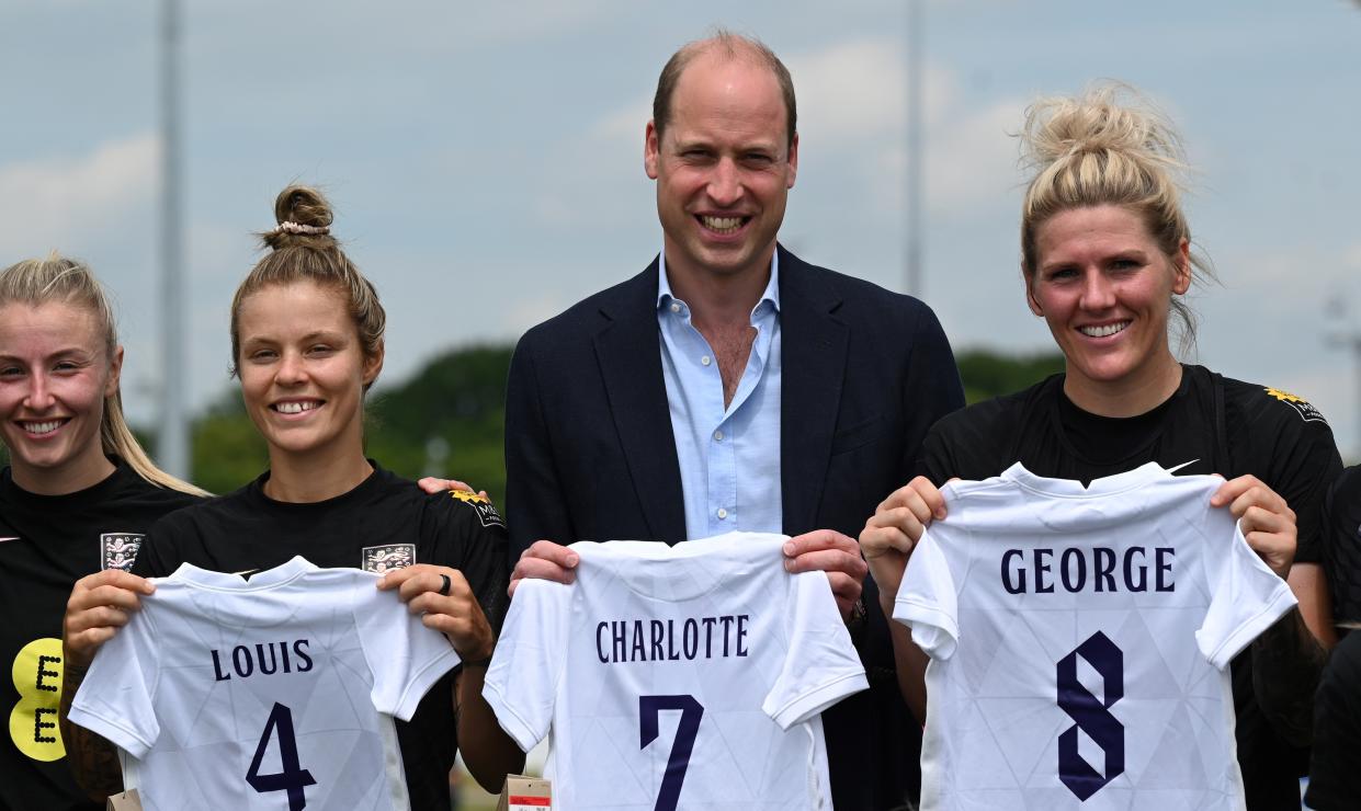 England's women footballers presented the Duke of Cambridge with football shirts for his three children, George, Charlotte, and Louis. (PA)
