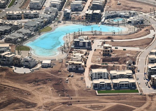 PHOTO: Construction continues at a residential community that surrounds a larger beach-like pool called Desert Color, April 16, 2023, in St. George, Utah. (The Denver Post via Getty Images)