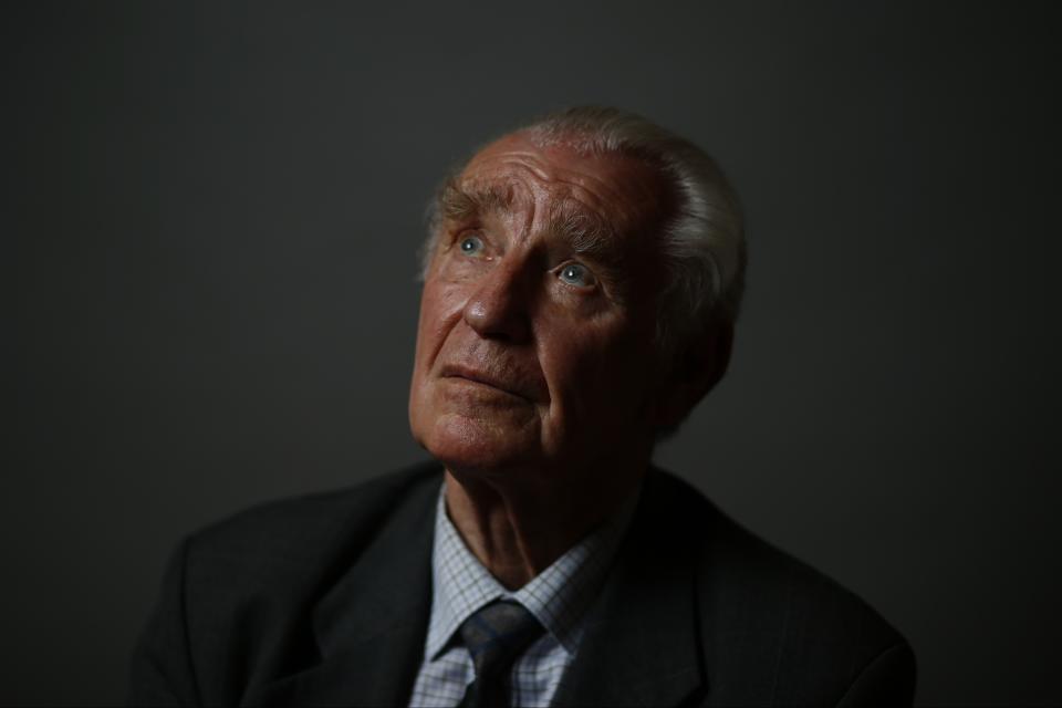 Auschwitz death camp survivor Jerzy Ulatowski poses for a photo in Warsaw