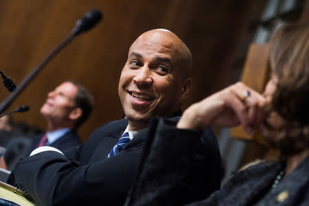 Sens. Cory Booker, D-N.J., and Kamala Harris, D-Calif., listen to Christine Blasey Ford testify during the Senate Judiciary Committee hearing on the nomination of Brett M. Kavanaugh to be an associate justice of the Supreme Court of the United States, focusing on allegations of sexual assault by Kavanaugh against Christine Blasey Ford in the early 1980s, in Washington, DC, U.S., September 27, 2018. Picture taken September 27, 2018. Tom Williams/Pool via REUTERS