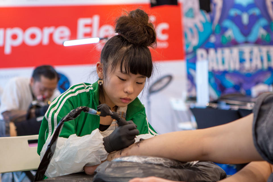 Noko, a 10-year-old Japanese tattoo artist