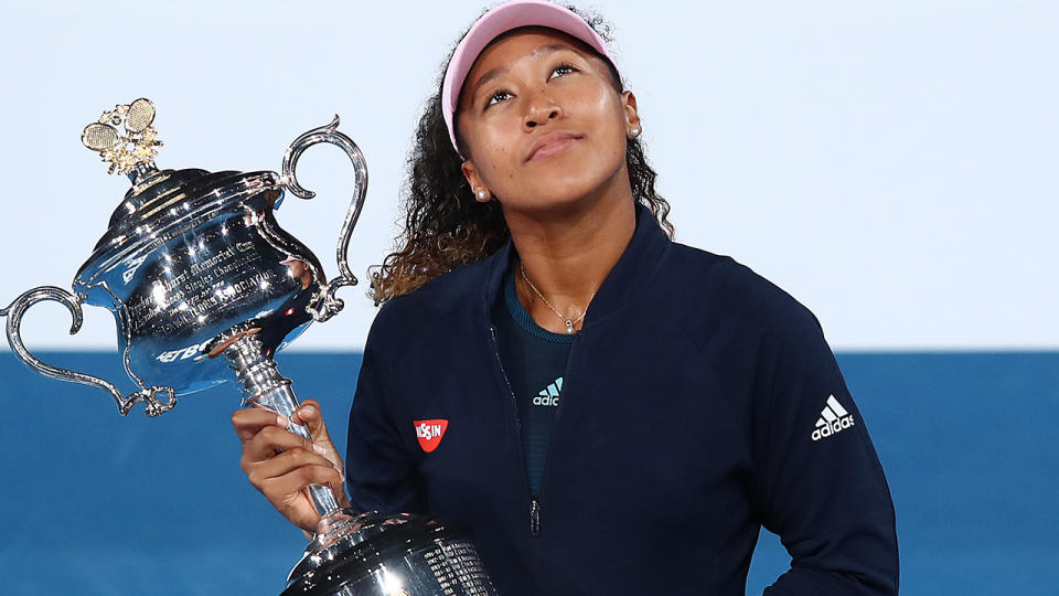 Naomi Osaka with the Daphne Akhurst Memorial Cup. (Photo by Julian Finney/Getty Images)