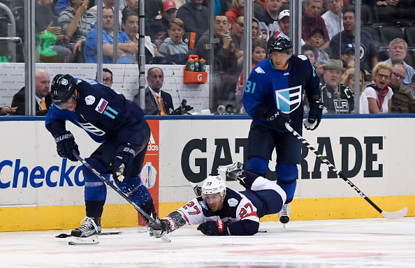 TORONTO, ON - SEPTEMBER 17: Ryan McDonagh #27 of Team USA dives to pulls the puck away from Anze Kopitar #11 with Marian Hossa #81 of Team Europe looking on during the World Cup of Hockey 2016 at Air Canada Centre on September 17, 2016 in Toronto, Ontario, Canada. (Photo by Minas Panagiotakis/World Cup of Hockey via Getty Images)