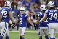 Indianapolis Colts kicker Adam Vinatieri (4) is congratulated after kicking a field goal during the first half of an NFL football game against the Atlanta Falcons, Sunday, Sept. 22, 2019, in Indianapolis. (AP Photo/Darron Cummings)