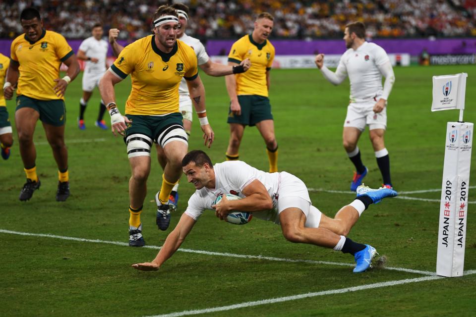 England's wing Jonny May scores a try during the Japan 2019 Rugby World Cup quarter-final match between England and Australia at the Oita Stadium in Oita on October 19, 2019. (Photo by CHARLY TRIBALLEAU / AFP) (Photo by CHARLY TRIBALLEAU/AFP via Getty Images)