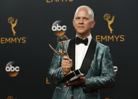 Producer Ryan Murphy poses backstage with the award for Outstanding Limited Series for "The People v. O.J. Simpson: American Crime Story" at the 68th Primetime Emmy Awards in Los Angeles, California U.S., September 18, 2016. REUTERS/Mario Anzuoni