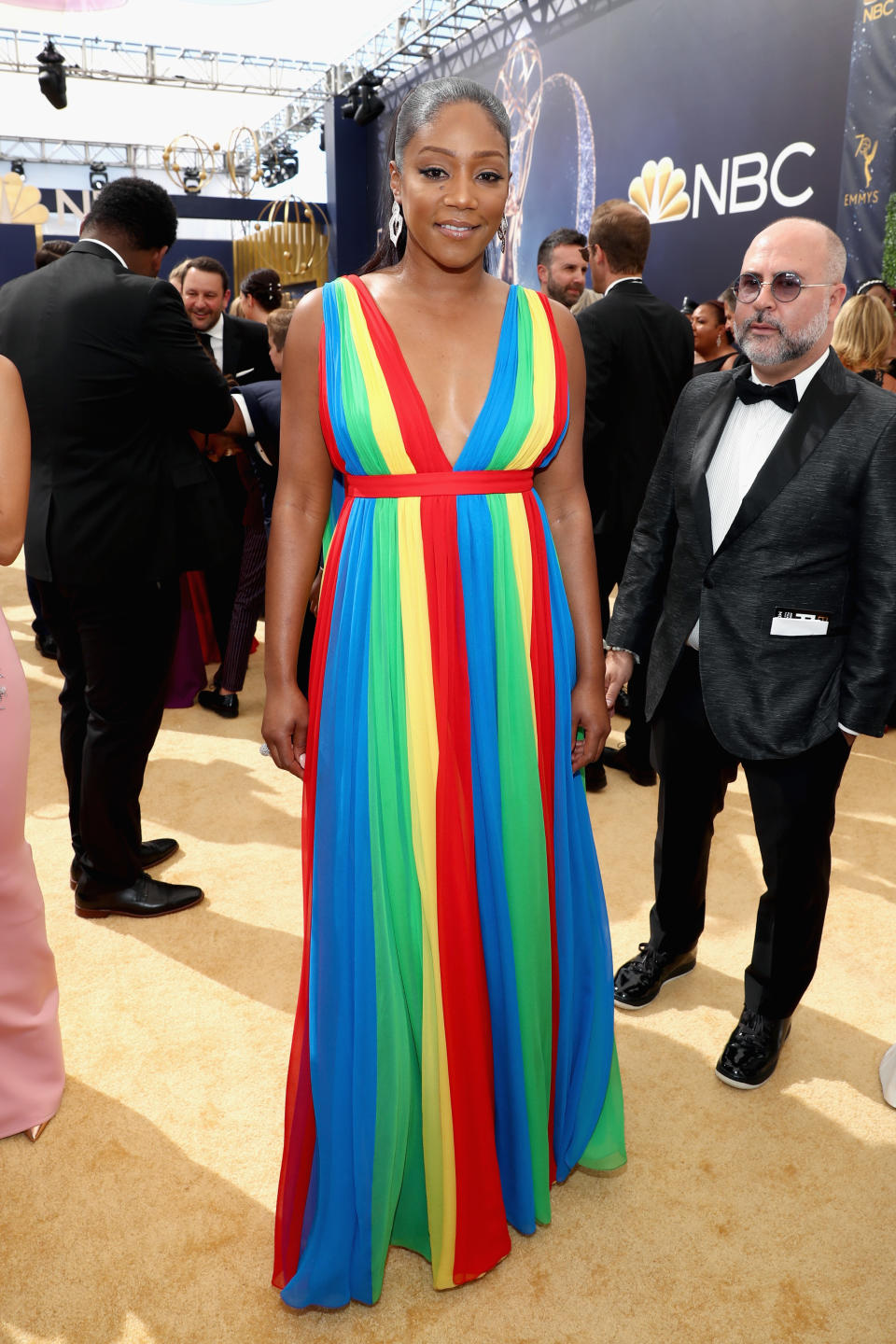 <p>Tiffany Haddish makes a statement with her rainbow dress. <br>Photo: Getty </p>