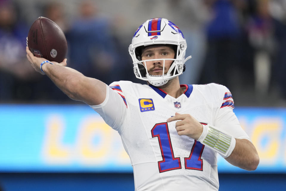 Buffalo Bills quarterback Josh Allen warms up before an NFL football game against the Los Angeles Chargers, Saturday, Dec. 23, 2023, in Inglewood, Calif. (AP Photo/Ashley Landis)