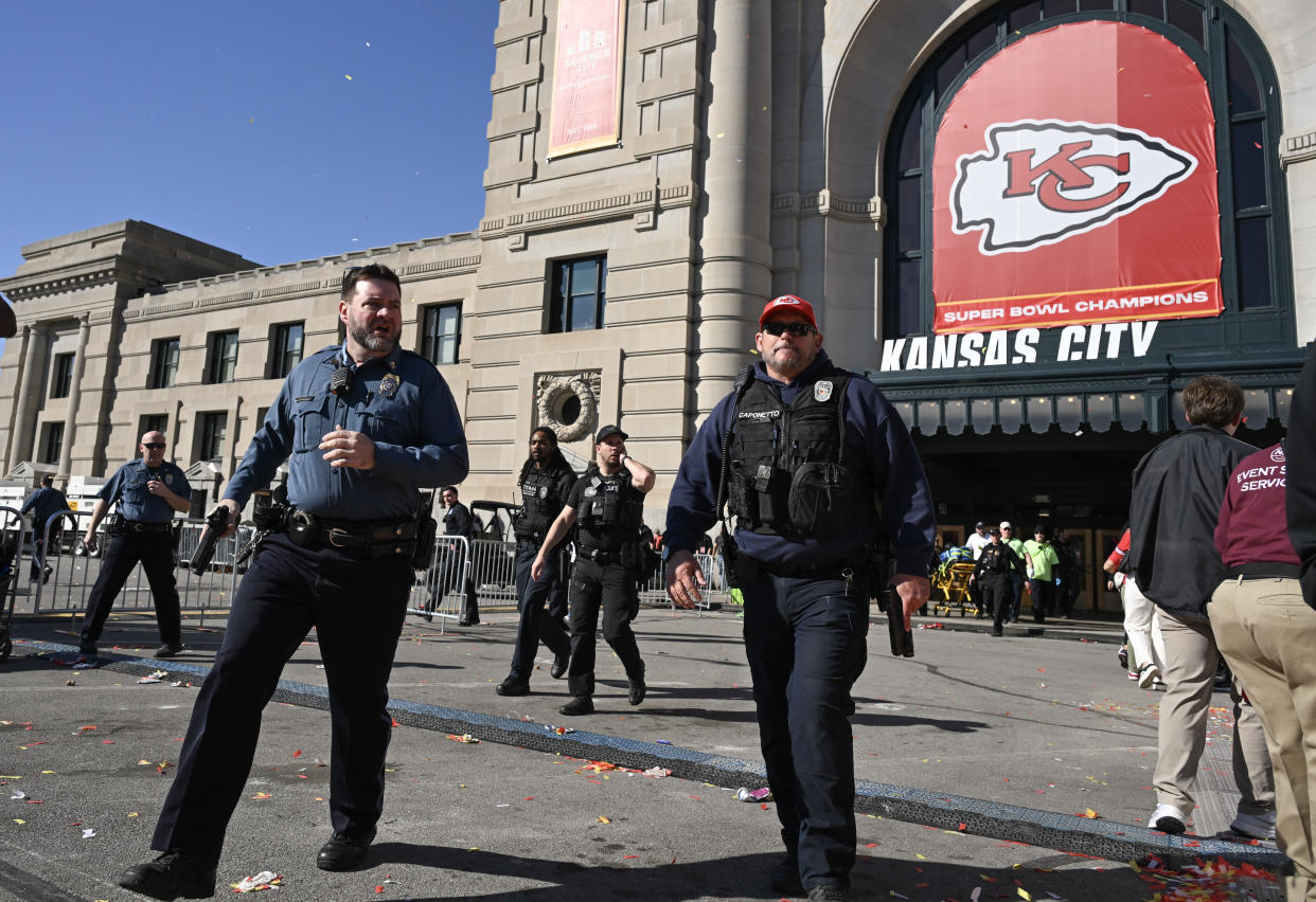 Police respond to shots fired near the Kansas City Chiefs' Super Bowl LVIII victory parade on February 14, 2024, in Kansas City, Missouri. (Photo by ANDREW CABALLERO-REYNOLDS / AFP) (Photo by ANDREW CABALLERO-REYNOLDS/AFP via Getty Images)