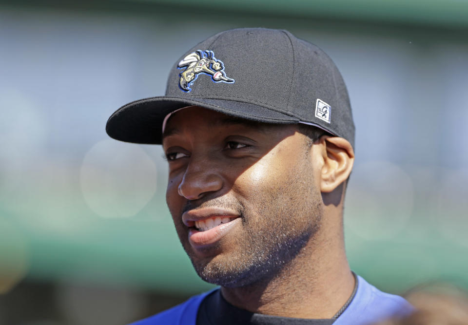 Retired NBA All-Star Tracy McGrady wears a baseball cap before working out at the Sugar Land Skeeters baseball stadium Wednesday, Feb. 12, 2014, in Sugar Land, Texas. McGrady hopes to try out as a pitcher for the independent Atlantic League Skeeters. (AP Photo/Pat Sullivan)