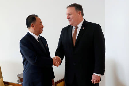 FILE PHOTO: North Korea's envoy Kim Yong Chol shakes hands with U.S. Secretary of State Mike Pompeo during their meeting in New York, U.S., May 31, 2018. REUTERS/Mike Segar/File Photo